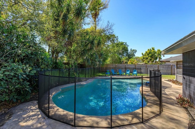 view of pool with a fenced backyard and a fenced in pool