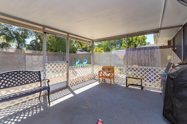 view of patio / terrace featuring grilling area and fence