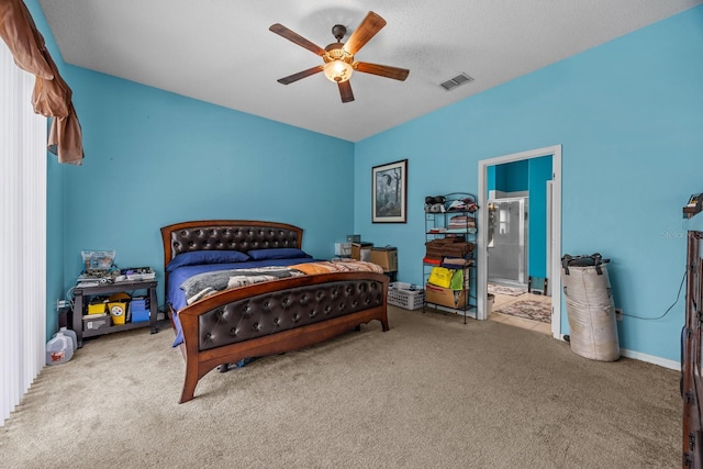 bedroom featuring light colored carpet and ceiling fan