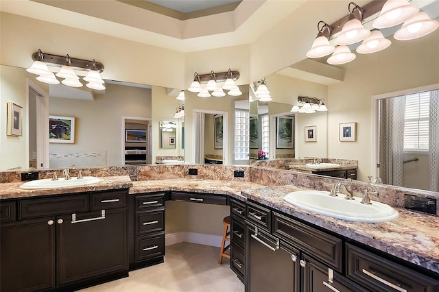 bathroom with vanity and tile patterned floors