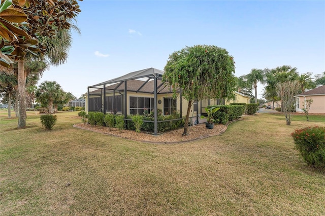 view of yard featuring a lanai