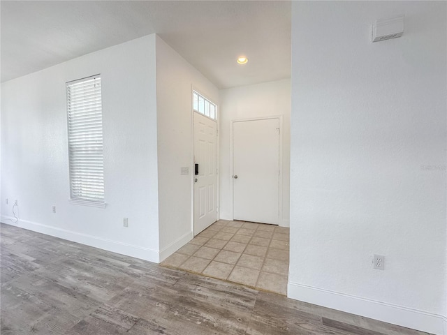 foyer featuring light wood-type flooring