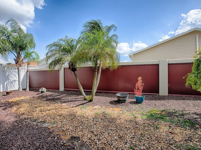 view of yard featuring a fenced backyard