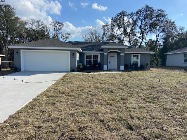 single story home with a garage and a front yard