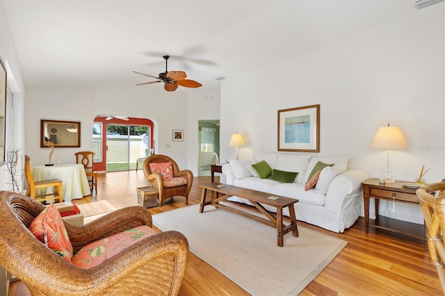 living area featuring ceiling fan and light wood finished floors