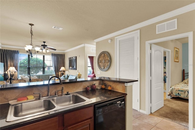 kitchen with pendant lighting, dishwasher, sink, ornamental molding, and light tile patterned floors