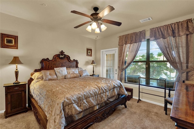 bedroom with light carpet and ceiling fan