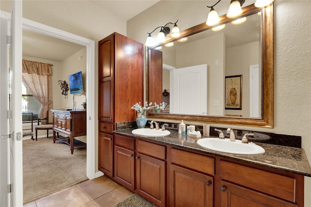 bathroom with vanity and tile patterned flooring