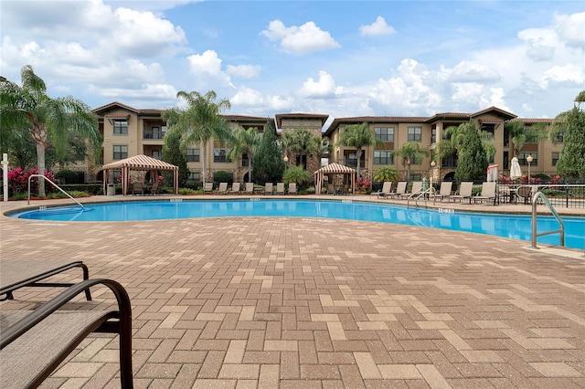 view of swimming pool with a gazebo