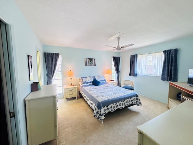933 Harbor Dr S, Venice, FL 34285 - bedroom with light colored carpet and a ceiling fan