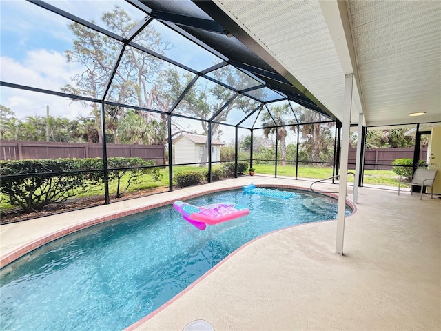 933 Harbor Dr S, Venice, FL 34285 - view of swimming pool featuring a patio, a fenced backyard, glass enclosure, and an outbuilding