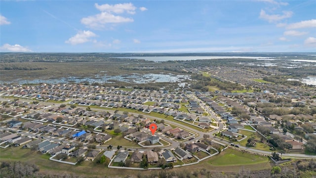 aerial view with a water view and a residential view