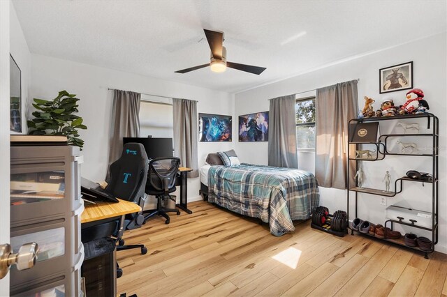 4723 Crk 306, Lake Panasoffkee, FL 33538 - bedroom with hardwood / wood-style floors and ceiling fan