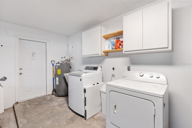 4723 Crk 306, Lake Panasoffkee, FL 33538 - washroom with water heater, washer and clothes dryer, and cabinets