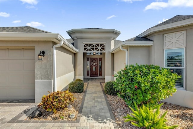 property entrance featuring a garage