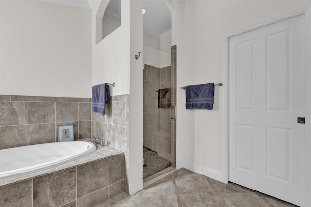 bathroom with crown molding, separate shower and tub, and tile patterned flooring