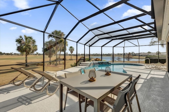 view of pool featuring a water view, a lanai, and a patio area