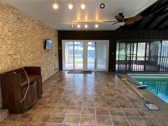 view of pool with ceiling fan