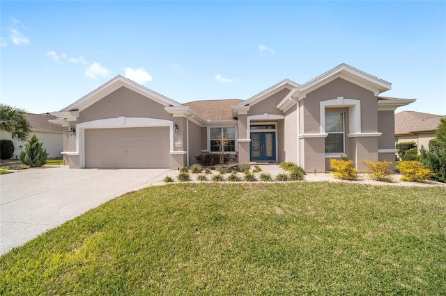 ranch-style home featuring driveway, an attached garage, french doors, a front lawn, and stucco siding