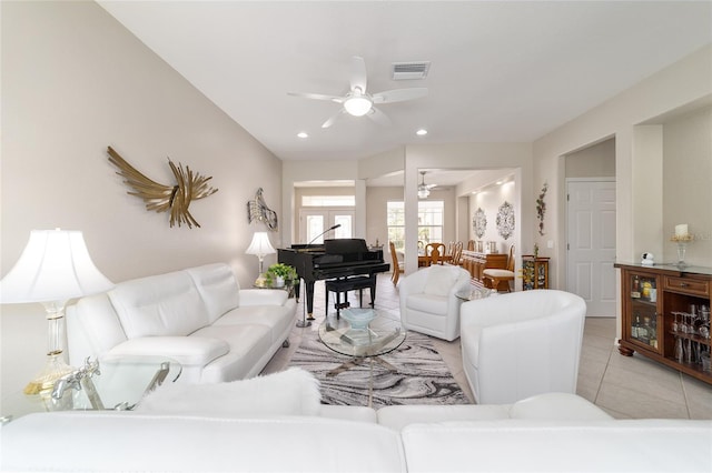 living area with recessed lighting, visible vents, ceiling fan, and light tile patterned flooring