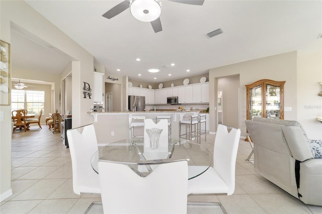 dining area with recessed lighting, visible vents, a ceiling fan, and light tile patterned flooring