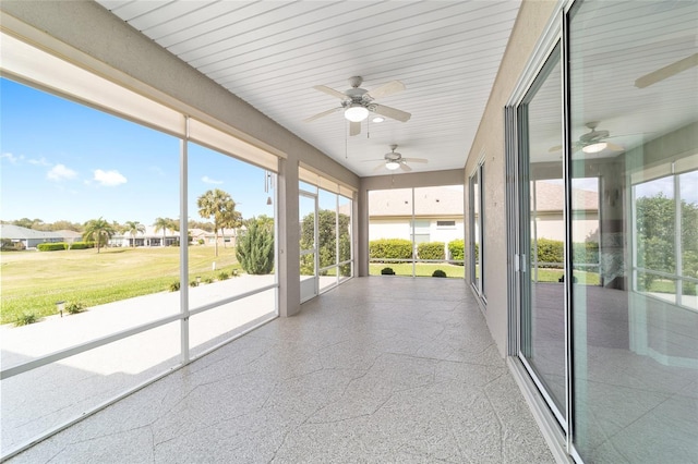 unfurnished sunroom featuring a healthy amount of sunlight