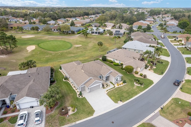 bird's eye view featuring view of golf course and a residential view