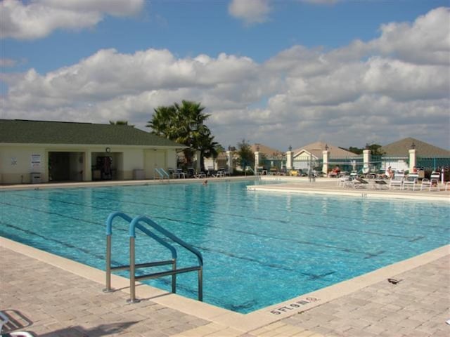 community pool with a patio