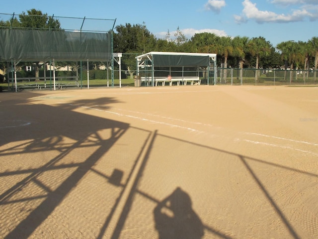 view of community with fence