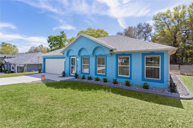 single story home featuring a front yard, fence, driveway, stucco siding, and a garage