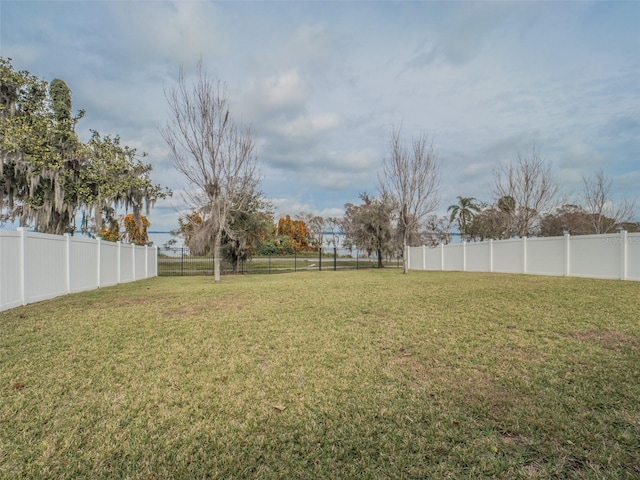 view of yard featuring a fenced backyard