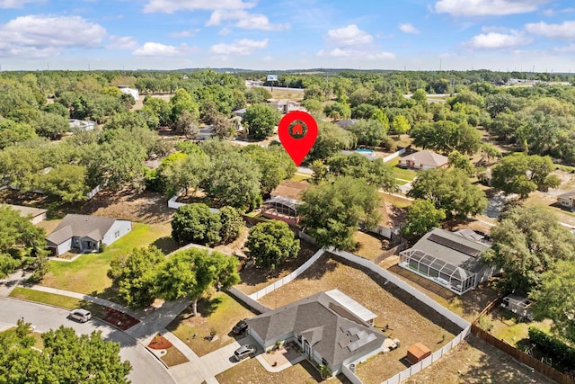 birds eye view of property with a residential view