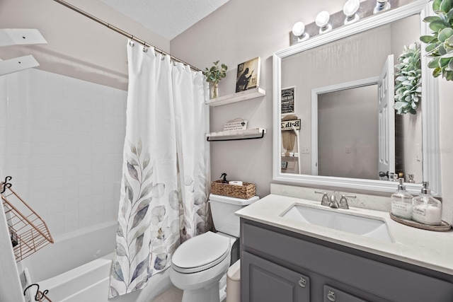 full bathroom with shower / tub combo with curtain, vanity, and toilet
