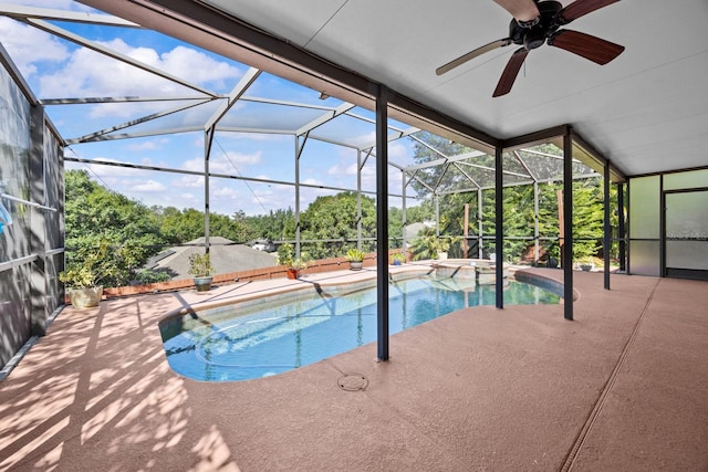 pool with a patio area, a lanai, and a ceiling fan
