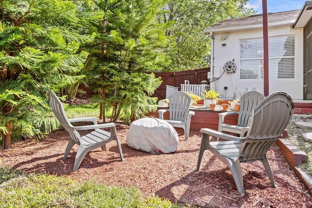 view of patio / terrace featuring fence