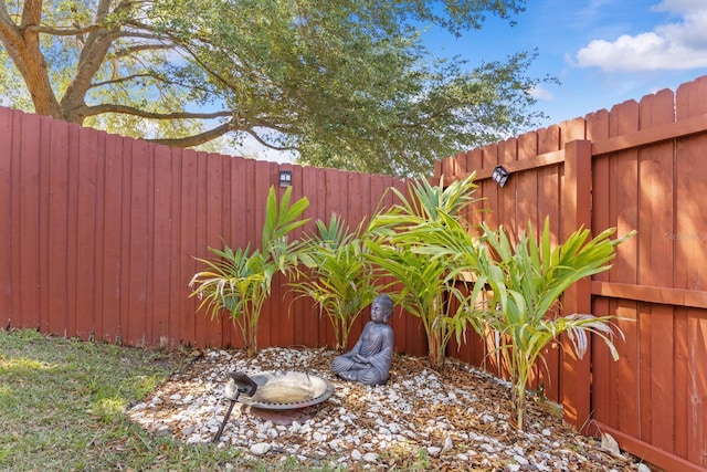 view of yard featuring a fenced backyard