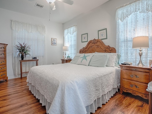 bedroom featuring wood-type flooring and ceiling fan