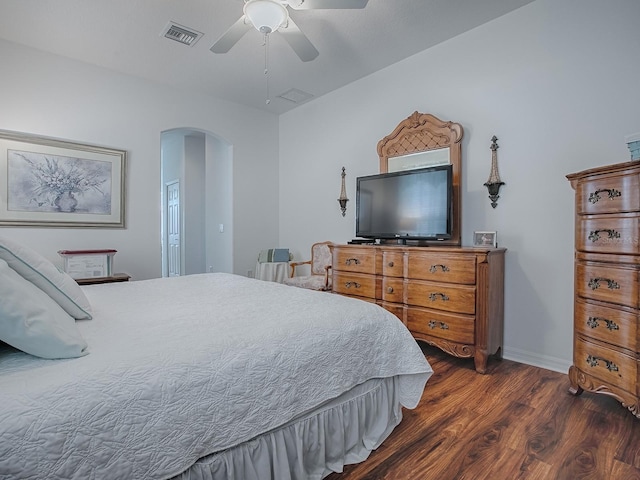 bedroom featuring ceiling fan and dark hardwood / wood-style floors