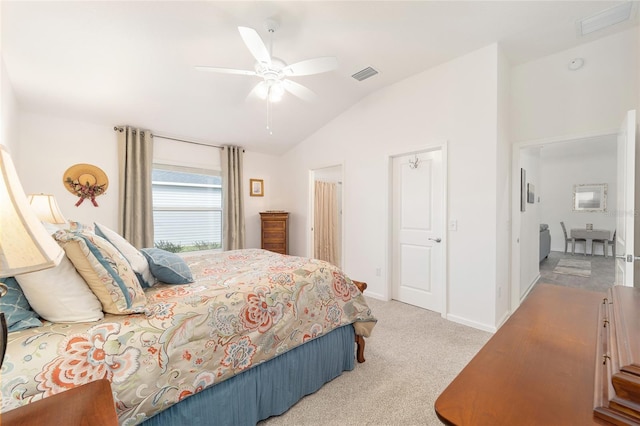 bedroom featuring visible vents, light carpet, vaulted ceiling, ceiling fan, and baseboards