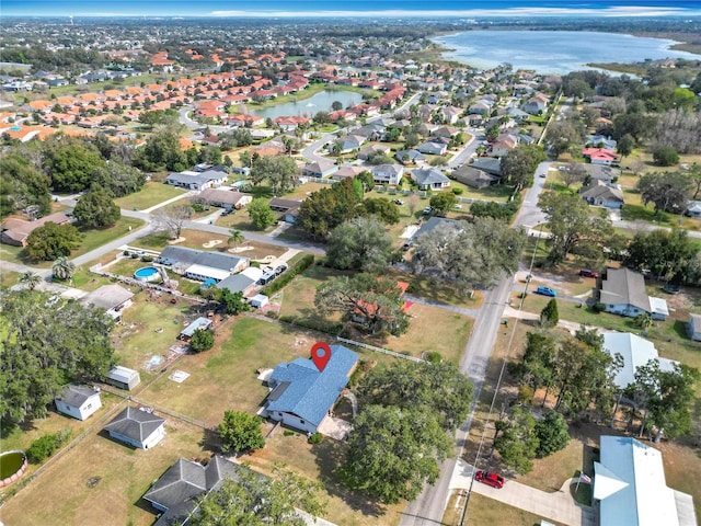 bird's eye view with a water view