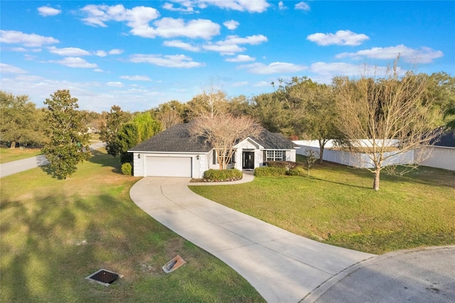 ranch-style home with a garage and a front lawn