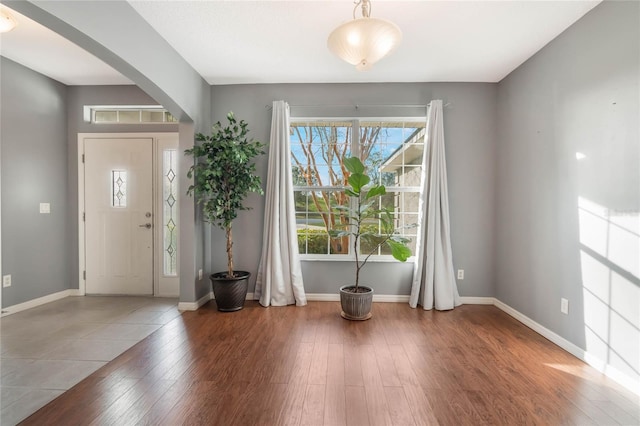 entrance foyer featuring hardwood / wood-style floors