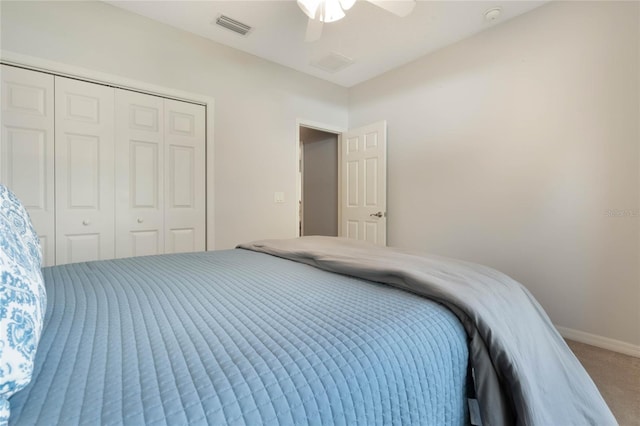 bedroom featuring ceiling fan, carpet floors, and a closet