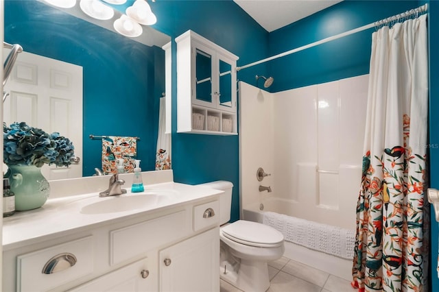 full bathroom featuring shower / bath combination with curtain, vanity, tile patterned floors, and toilet