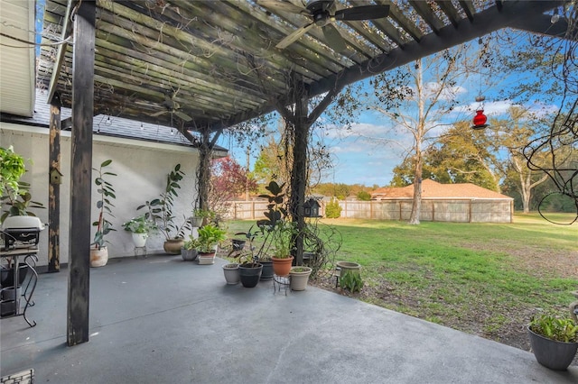 view of patio / terrace featuring ceiling fan and a pergola