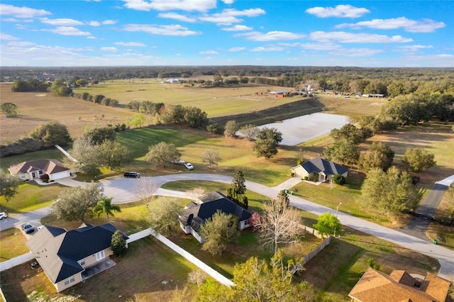 aerial view with a water view and a rural view