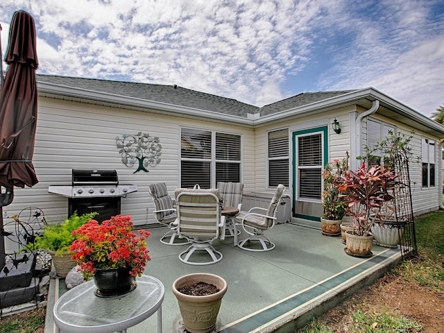 view of patio / terrace featuring outdoor dining space and area for grilling