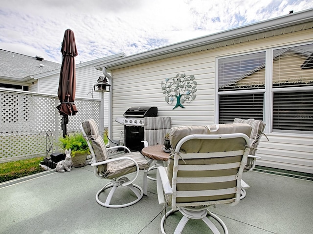 view of patio / terrace featuring fence and area for grilling