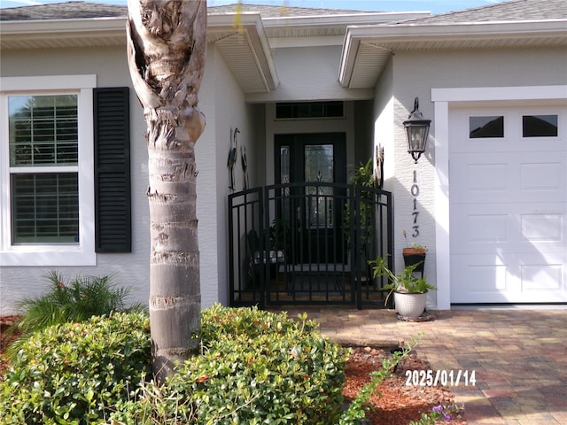 property entrance featuring a garage