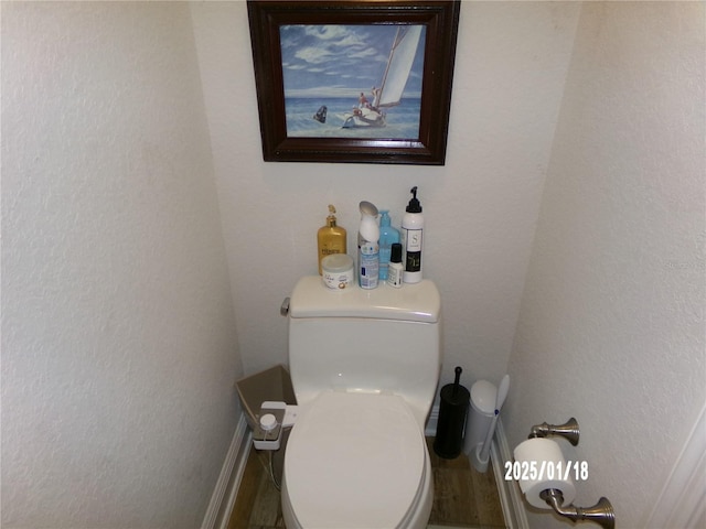 bathroom featuring toilet